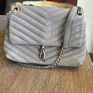 Authentic cute grey Rebecca mink off crossbody.  Excellent used condition.